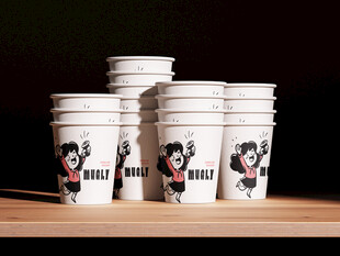 堆叠的卡通图案纸杯展示样机