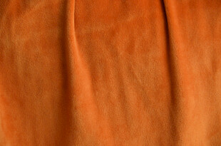 橙色毛绒 褶皱布料纹理特写