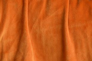 橙色毛绒 褶皱布料纹理特写