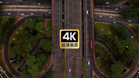 航拍城市立交桥上穿梭车流