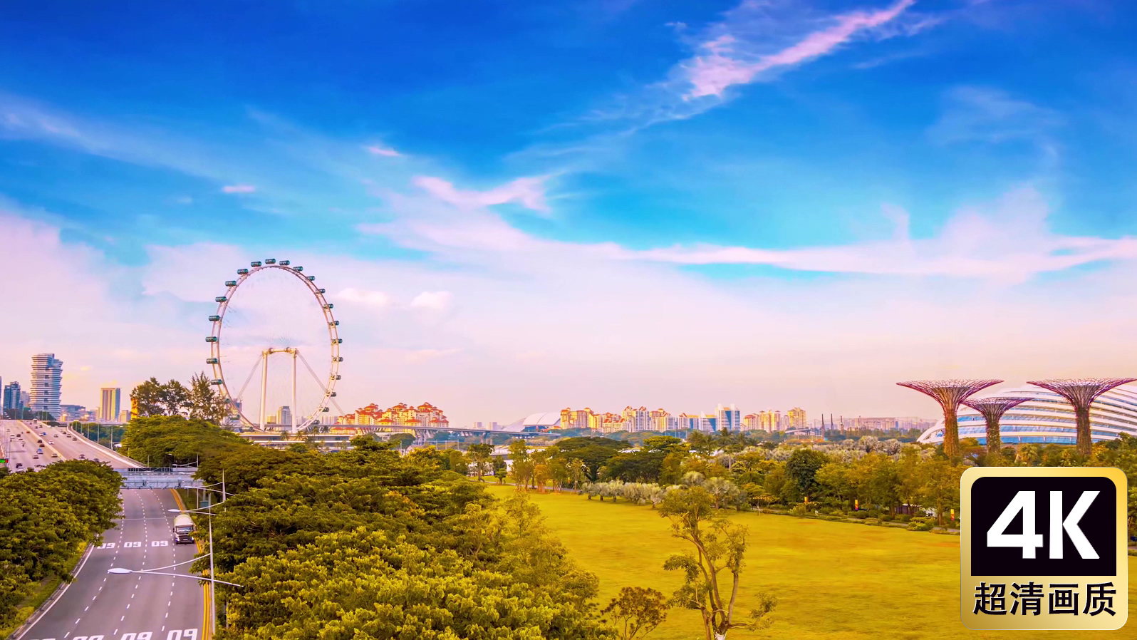 航拍游乐场摩天轮道路车流