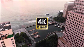 航拍邮轮驶过海港商务大厦