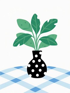 波点花瓶中的绿叶植物