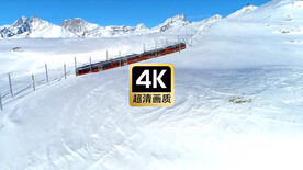 航拍雪原上奔驰的列车